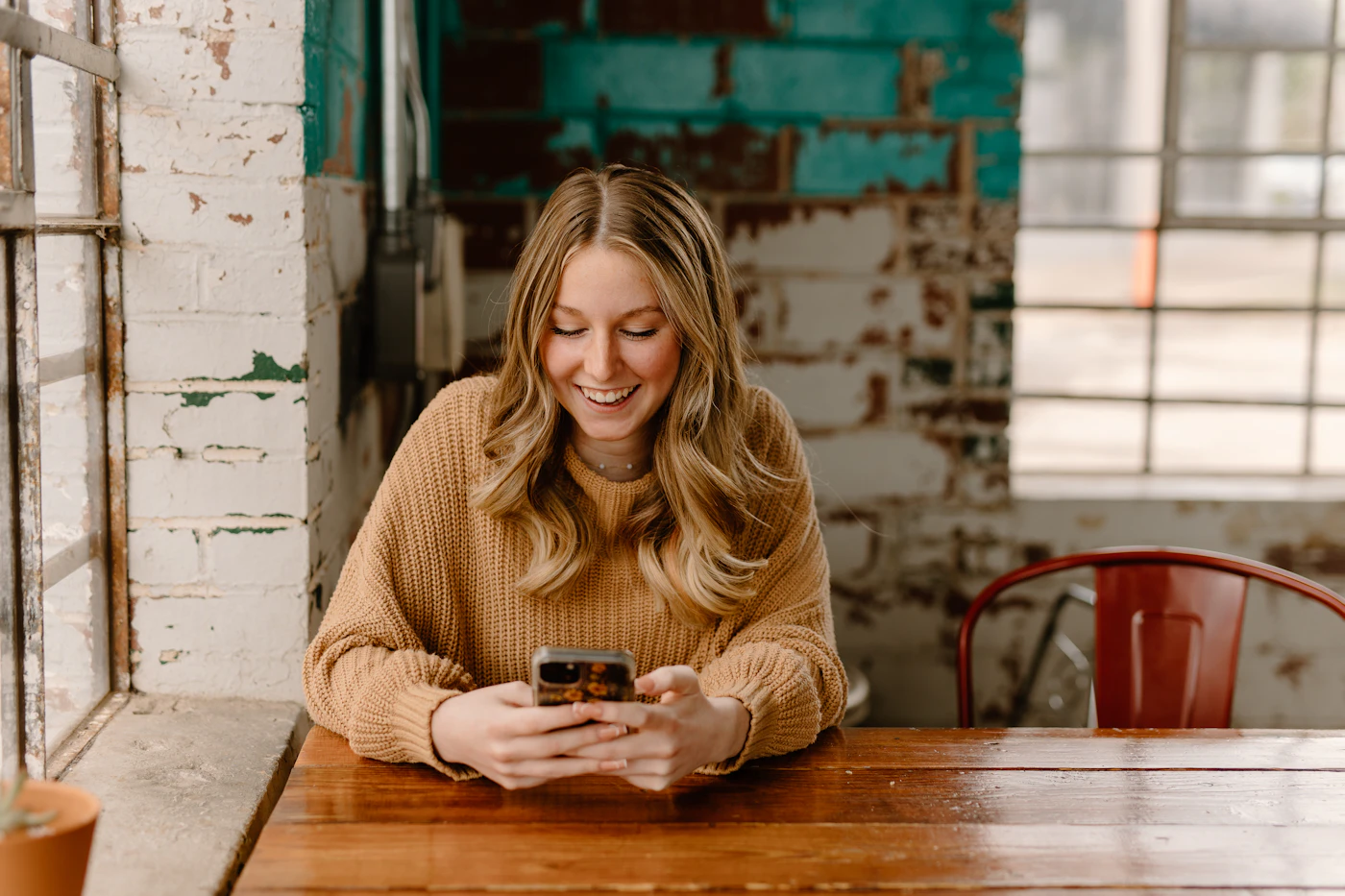 Customer chatting with a business on her phone